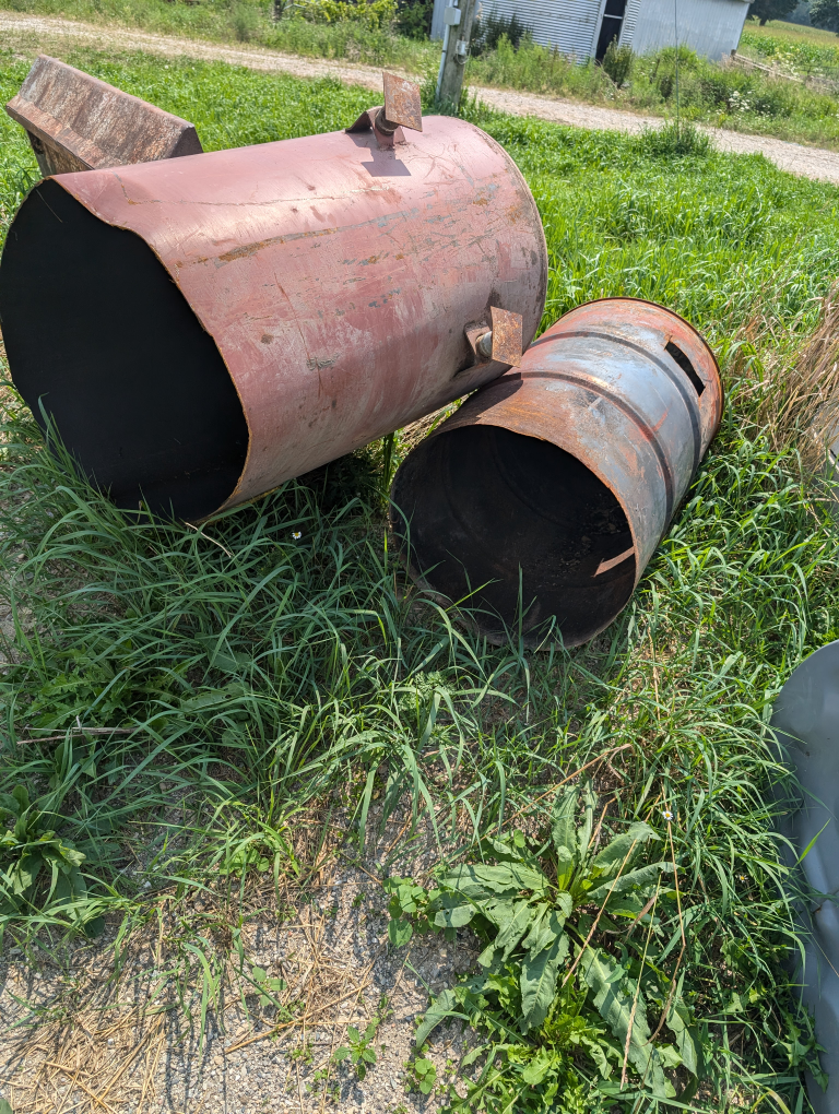 oil burn barrel and acetylene tanks
