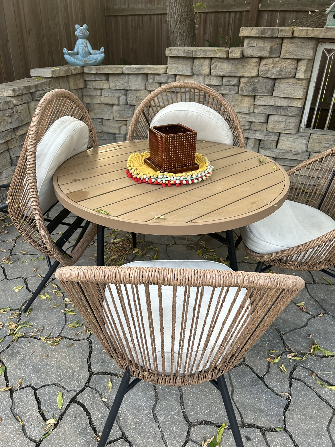 Outdoor table and chairs with cushions