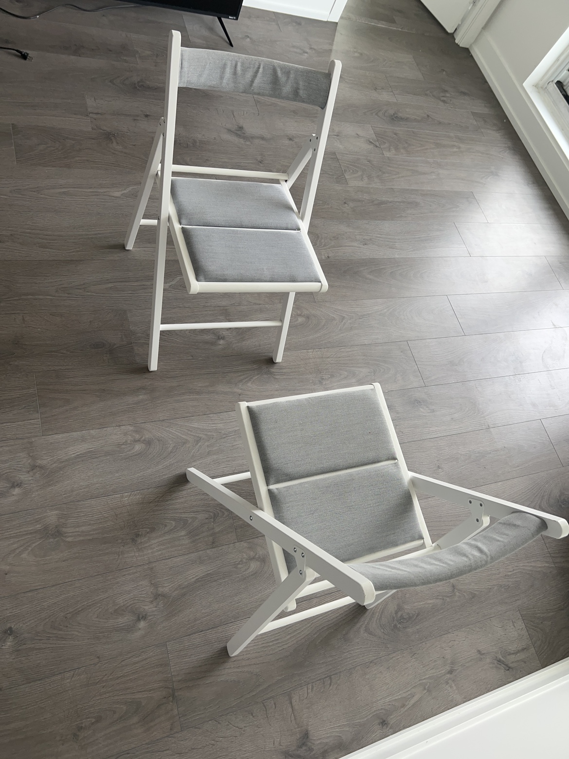 A Set of IKEA’s FROSVI White Folding Chairs with Grey Cushion - photo 4