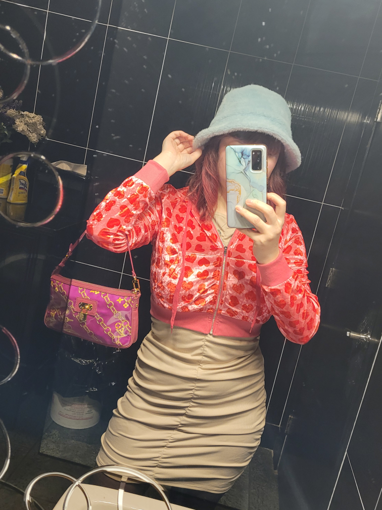 Limited edition fuschia Monogram charms pochette image indicator(8)