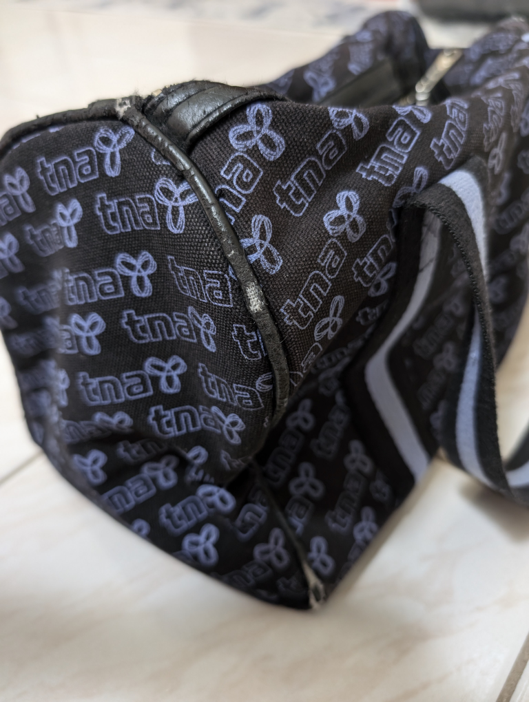 TNA  Black and Purple Mini Duffle Bag image indicator(6)