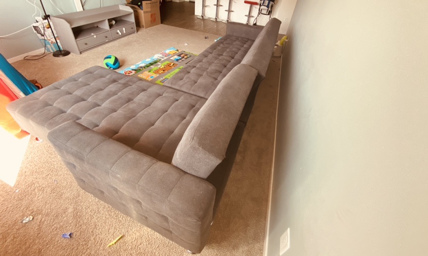 SOFA- SECTIONAL - Can turn into bed , includes Sofa cover too