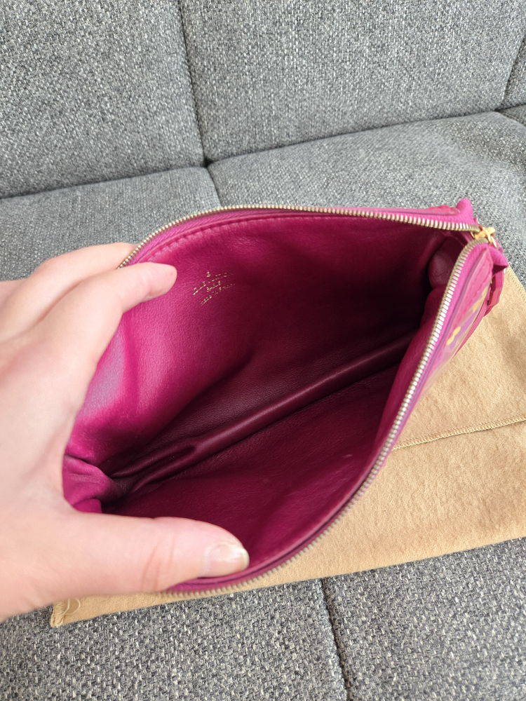 Limited edition fuschia Monogram charms pochette image indicator(3)